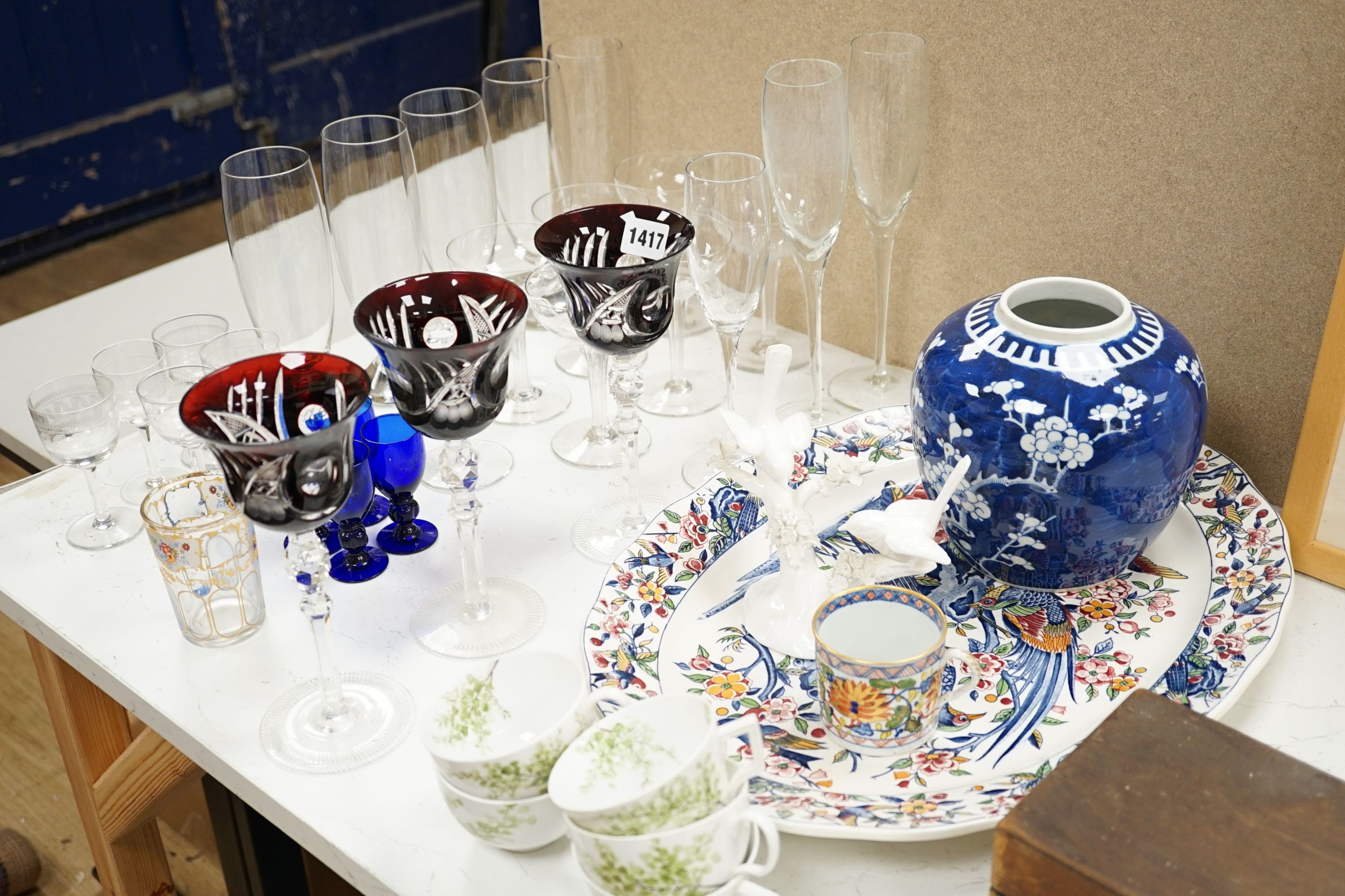 Three ruby overlaid wine glasses, a set of champagne glasses, a meat platter etc